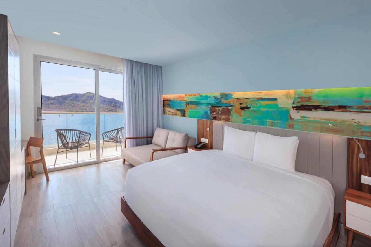 Habitación Doble Deluxe con balcón y vistas al océano - 1 cama extragrande