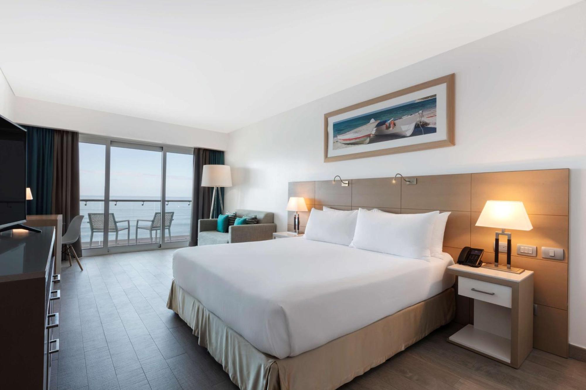 Suite Junior con cama grande y balcón - Frente al mar