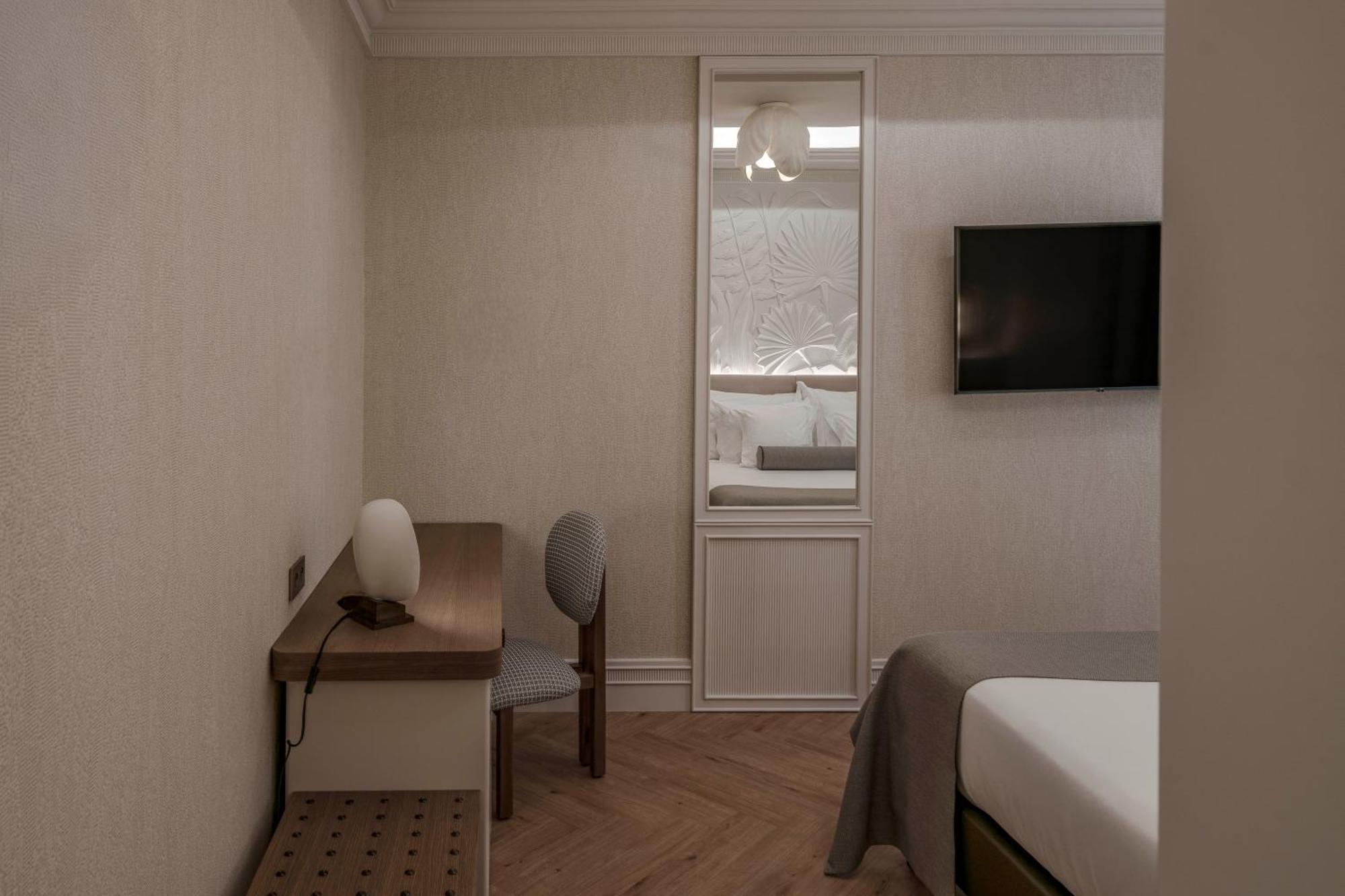Habitación Vincci con sofá