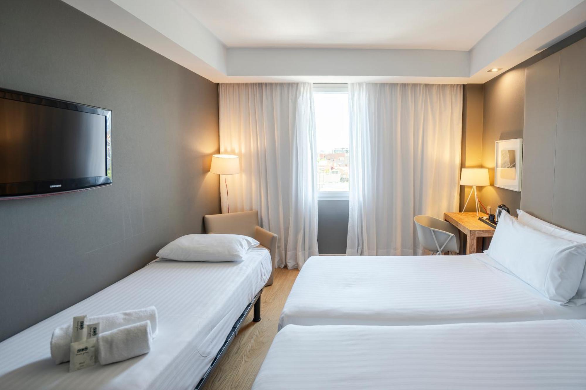 Habitación Doble con cama supletoria (2 adultos + 1 niño) - 2 camas