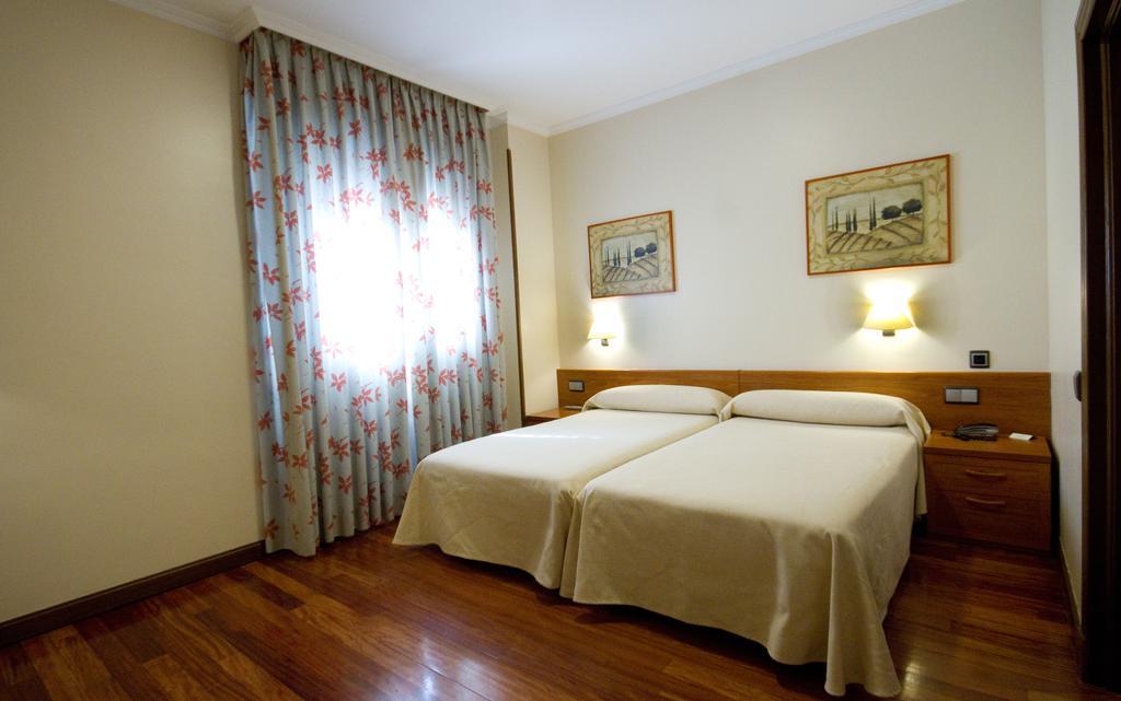 Habitación Doble con cama supletoria - 2 camas