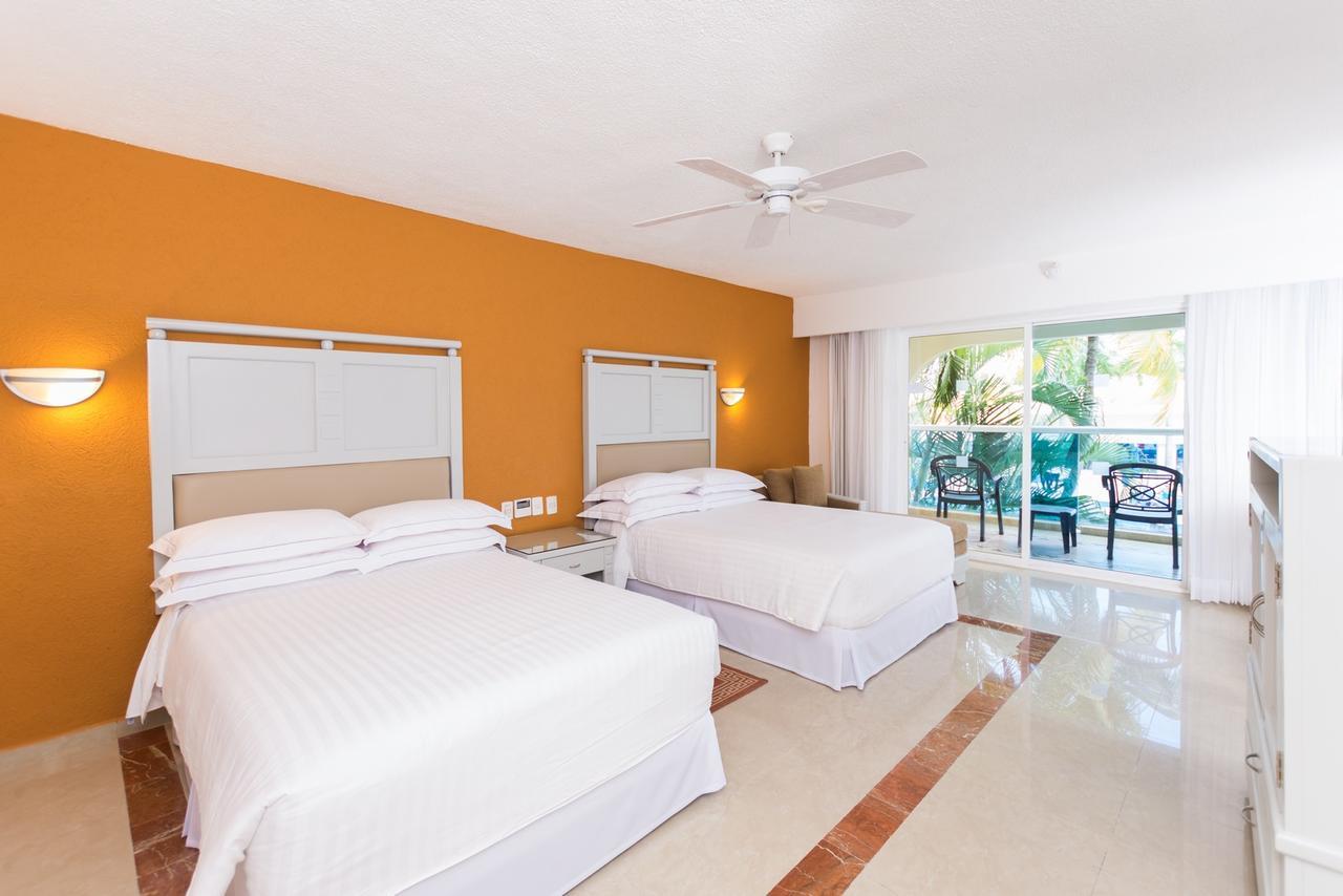 Habitación Doble con terraza (2 adultos + 2 niños)