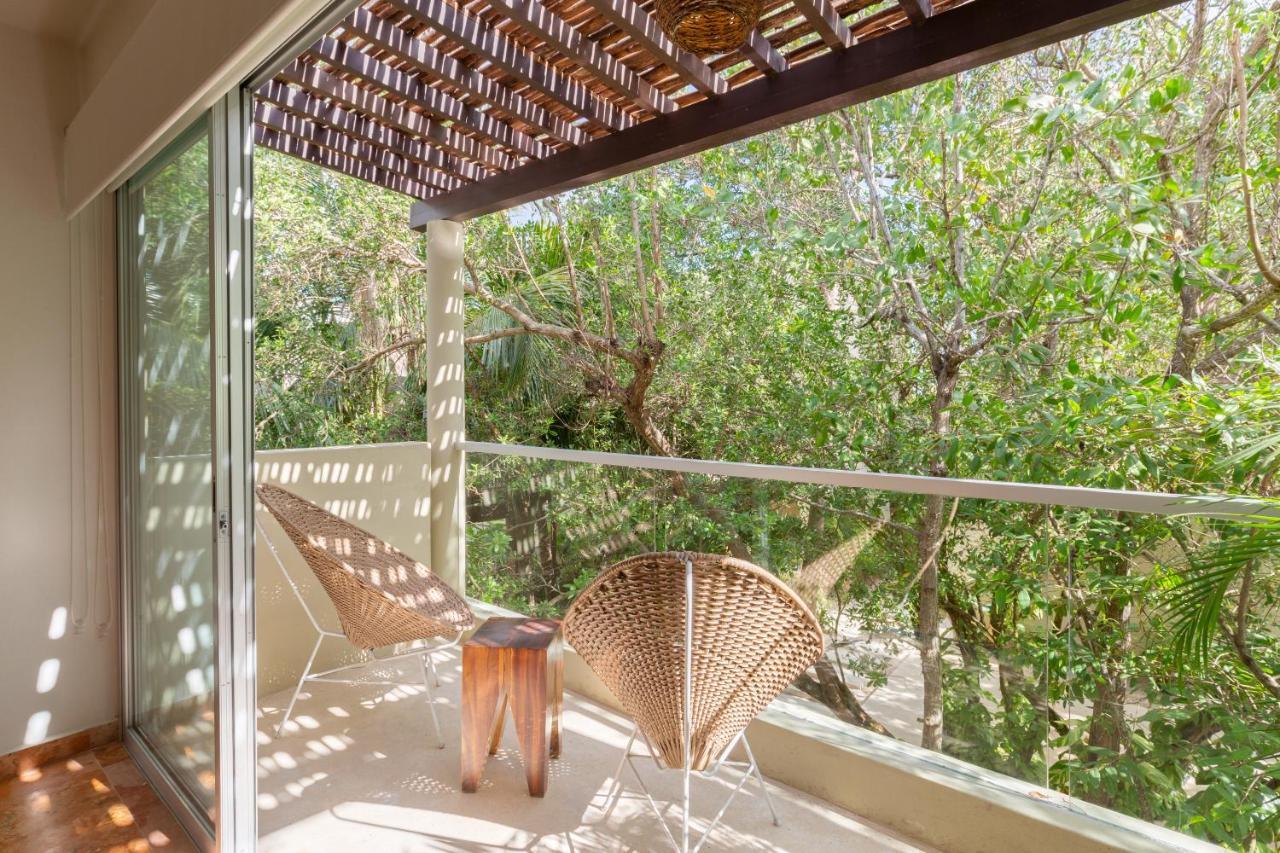 Suite con 2 habitaciones dobles y vistas al jardín